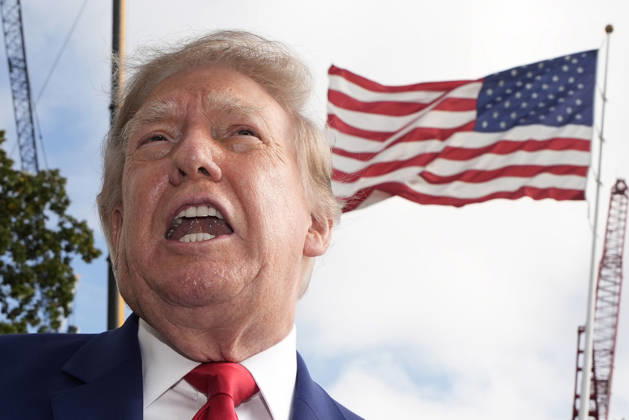 President Donald Trump talks to the members of the media on the South Lawn as he departs the White House in Washington en route Dalton, Georgia on Friday, October 16, 2026.  WASP2026101610123 YurixGripas