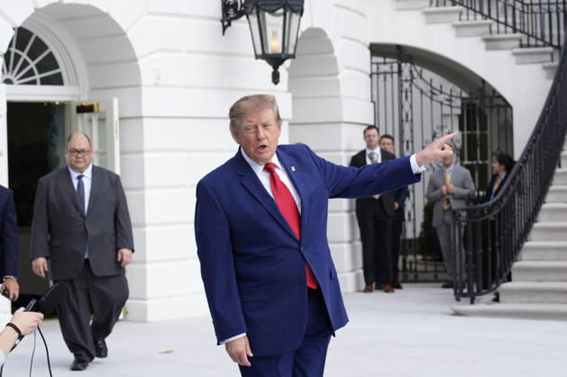 President Donald Trump talks to the members of the media on the South Lawn as he departs the White House in Washington en route Dalton, Georgia on Friday, October 16, 2026.  WASP2026101610144 YurixGripas
