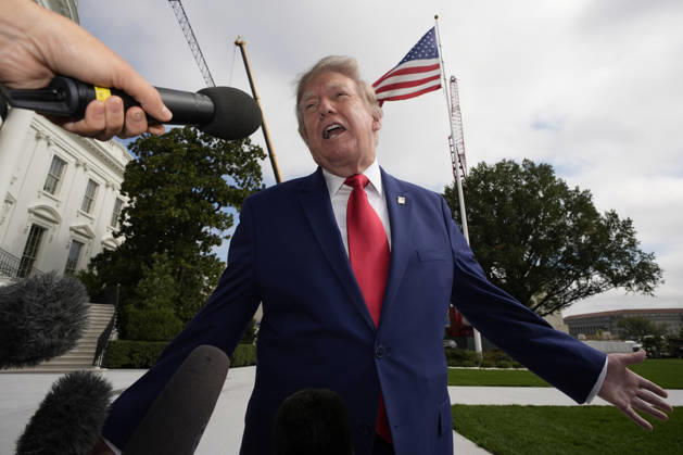 President Donald Trump talks to the members of the media on the South Lawn as he departs the White House in Washington en route Dalton, Georgia on Friday, October 16, 2026.  WASP20261016107 YurixGripas