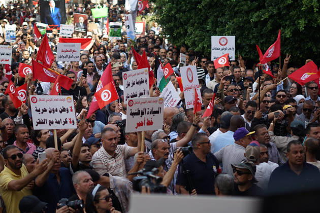 October 17, 2026, Tunis, Tunis, Tunisia, Tunisia: Demonstrators take to the streets of Tunis during a march calling for social and economic reforms and the protection of civil liberties, amid public concerns over rising living costs, workersâ€⠢ rights and freedom of expression on October 17, 2026. Organized by trade unions, journalistsâ€⠢ representatives, lawyers and civil society groups, the demonstration brings together protesters demanding accountability and defending fundamental rights. The march highlights ongoing concerns over Tunisiaâ€⠢s economic situation and the space for public dissent. Tunis Tunisia - ZUMAm342 20261017_zsp_m342_038 Copyright: xHasanxMradx