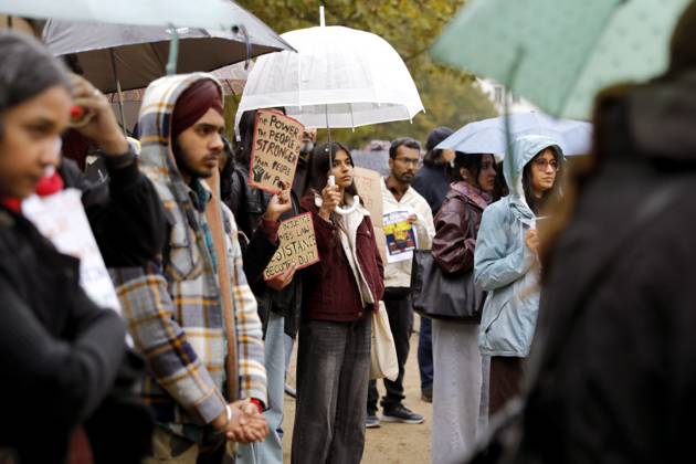 October 17, 2026, Berlin, Germany: BERLIN, GERMANY - OCTOBER 17, 2026: A small group of demonstrators hold placards at Oranienplatz in the Kreuzberg district to show solidarity with mass protests in India and to protest against the crackdown on them, as several people take the floor to discuss the situation. The demonstration followed a call by Neha Bora, president of the All India StudentsÃ¢â‚¬â ¢ Association (AISA), for people everywhere to back the protests, saying Ã¢â‚¬oeeverywhere is Jantar MantarÃ¢â‚¬Â, the site in Delhi where the main protests are taking place. The protests demand the resignation of Chief Election Commissioner Gyanesh Kumar over a revision of electoral rolls that opponents say led to the mass deletion of voters, whi  - ZUMAq101 20261017_zna_q101_068 Copyright: xAlessiaxCoccax