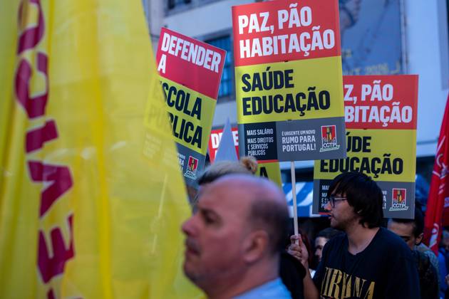 October 17, 2026, Porto, Portugal: Protesters hold placards during the National CGTP demonstration. Thousands of people joined the National General Confederation of the Portuguese Workers National Inter-Union (Confederacao Geral dos Trabalhadores Portugueses Intersindical Nacional) (CGTP) demonstration in Porto, marching from Praca da Batalha to Praca de D. Joao I, where they converged with participants of a housing rights protest. Porto Portugal - ZUMAs197 20261017_aaa_s197_271 Copyright: xDiogoxBaptistax