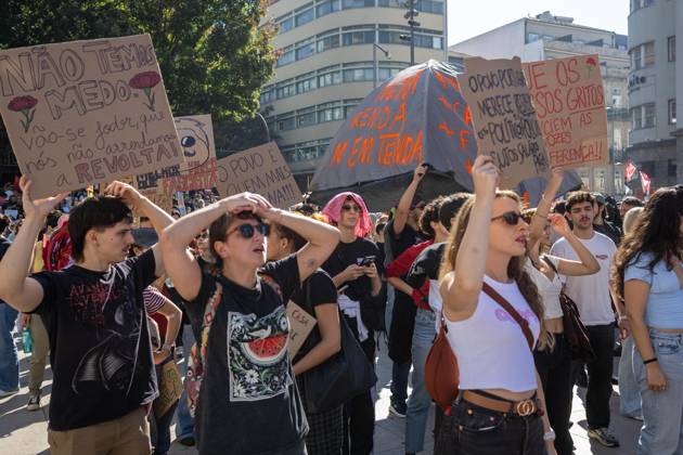 October 17, 2026, Porto, Portugal: Protesters hold placards with political messages during a housing rights demonstration. Thousands of people joined the National General Confederation of the Portuguese Workers National Inter-Union (Confederacao Geral dos Trabalhadores Portugueses Intersindical Nacional) (CGTP) demonstration in Porto, marching from Praca da Batalha to Praca de D. Joao I, where they converged with participants of a housing rights protest. Porto Portugal - ZUMAs197 20261017_aaa_s197_283 Copyright: xDiogoxBaptistax