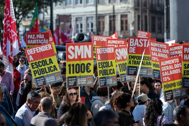 October 17, 2026, Porto, Portugal: Protesters hold placards during the National CGTP demonstration. Thousands of people joined the National General Confederation of the Portuguese Workers – National Inter-Union (Confederação Geral dos Trabalhadores Portugueses – Intersindical Nacional) (CGTP) demonstration in Porto, marching from Praça da Batalha to Praça de D. João I, where they converged with participants of a housing rights protest. Porto Portugal - ZUMAs197 20261017_aaa_s197_276 Copyright: xDiogoxBaptistax