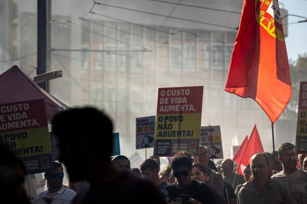 October 17, 2026, Porto, Portugal: Protesters hold placards during the National CGTP demonstration. Thousands of people joined the National General Confederation of the Portuguese Workers – National Inter-Union (Confederação Geral dos Trabalhadores Portugueses – Intersindical Nacional) (CGTP) demonstration in Porto, marching from Praça da Batalha to Praça de D. João I, where they converged with participants of a housing rights protest. Porto Portugal - ZUMAs197 20261017_aaa_s197_301 Copyright: xDiogoxBaptistax