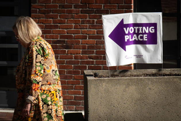 October 17, 2026, Port Moody, Bc, CANADA: A woman walks past a sign directing people to a polling station in Vancouver, on Saturday Oct. 17, 2026. British Columbians are heading to the polls to cast their votes in municipal elections being held across the province. Port Moody CANADA  - ZUMAc35_ 20261017_zaf_c35_014 Copyright: xEthanxCairnsx