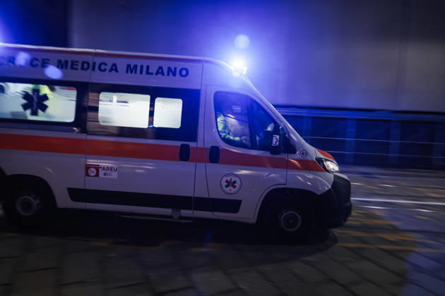 IPA89830556 - Milan: Damage caused by clashes between protesters and police during the Italia in Piazza demonstration against the high cost of living in the city center. Pictured: An ambulance on Missori Street  Copyright: xAlessandroxBremecx xx IPA89830556
