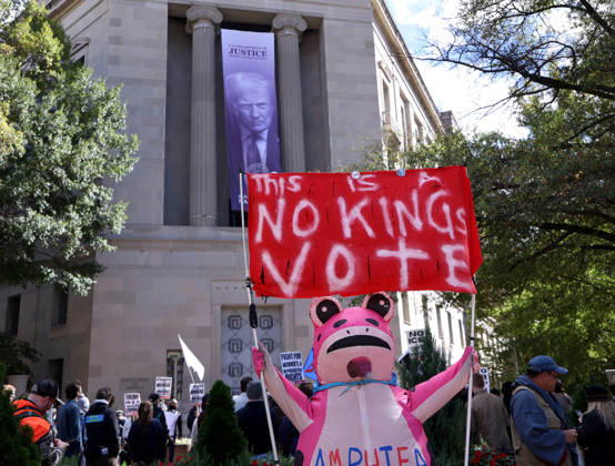 October 17, 2026, Washington, District Of Columbia, USA: Demonstrators hold banners as they rally in front of the Department of Justice (DOJ) during a No Kings protest in Washington DC, USA on October 17, 2026. Washington USA  - ZUMAs337 20261017_znp_s337_040 Copyright: xGentxShkullakux
