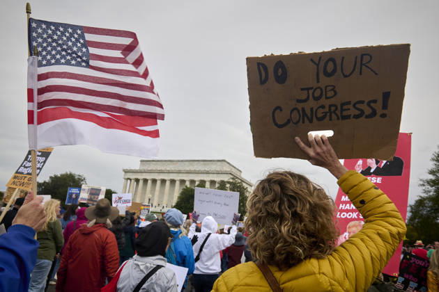 October 17, 2026, Washington Dc, Washington Dc, USA: No Kings protesters rally at the steps of the Lincoln Memorial in Washington DC, Oct. 17, 2026. The march, intended to encourage people to vote in the 2026 US midterm elections, was part of a 50-state get out the vote operation by the left-leaning Indivisible group. Protesters denounced the administration of US President Donald Trump and the Republican-led Congress for violating Constitutional and civil rights, federal and state laws, judicial orders and longstanding norms, casting Trump and the GOP as a threat to democracy. Washington Dc USA - ZUMAg216 20261017_znp_g216_007 Copyright: xDominicxGwinnx