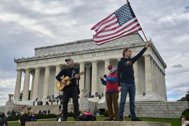 October 17, 2026, Washington Dc, Washington Dc, USA: No Kings protesters rally at the steps of the Lincoln Memorial in Washington DC, Oct. 17, 2026. The march, intended to encourage people to vote in the 2026 US midterm elections, was part of a 50-state get out the vote operation by the left-leaning Indivisible group. Protesters denounced the administration of US President Donald Trump and the Republican-led Congress for violating Constitutional and civil rights, federal and state laws, judicial orders and longstanding norms, casting Trump and the GOP as a threat to democracy. Washington Dc USA - ZUMAg216 20261017_znp_g216_021 Copyright: xDominicxGwinnx