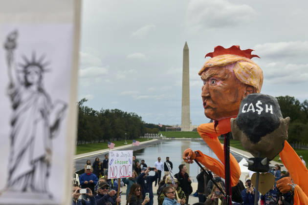 October 17, 2026, Washington Dc, Washington Dc, USA: No Kings protesters carry effigies of US President Donald Trump and members of his administration to a rally at the steps of the Lincoln Memorial in Washington DC, Oct. 17, 2026. The march, intended to encourage people to vote in the 2026 US midterm elections, was part of a 50-state get out the vote operation by the left-leaning Indivisible group. Protesters denounced the Trump administration and the Republican-led Congress for violating Constitutional and civil rights, federal and state laws, judicial orders and longstanding norms, casting Trump and the GOP as a threat to democracy. Washington Dc USA - ZUMAg216 20261017_znp_g216_012 Copyright: xDominicxGwinnx