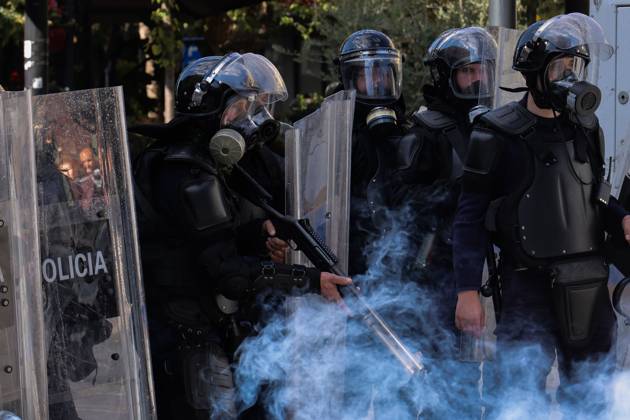 October 18, 2026, Tirana, Albania: TIRANA, ALBANIA, OCTOBER 18, 2026: Demonstrators clash with riot police outside the Ministry of Education in Tirana as student-led anti-government protests continue for a sixth consecutive day. Protesters throw stones while police respond with tear gas, water cannons and rubber bullets. The demonstrations demand improved university conditions and the resignation of Prime Minister Edi Rama. Tirana Albania  - ZUMAq101 20261018_zna_q101_068 Copyright: xVlasovxSulajx