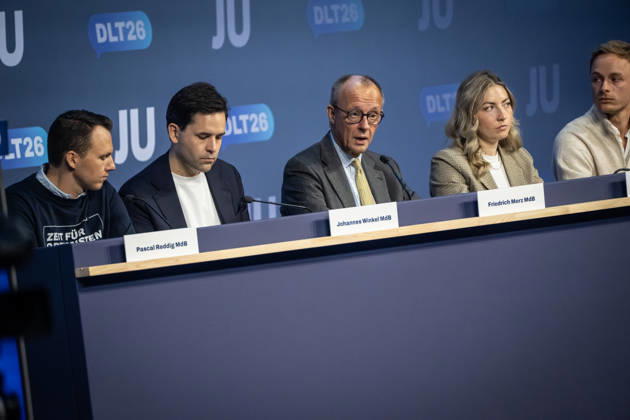 Pascal Reddig, Deputy Federal Chair of the JU; Johannes Winkel, Federal Chair of the JU; Friedrich Merz, Federal Chancellor; Ann Cathrin Simon, Deputy Federal Chair of the JU; Julien Jopp, Deputy Federal Chair of the JU, from left to right on stage following the Federal Chancellor’s speech at the 78th Germany Day 2026 in Bonn. Junge