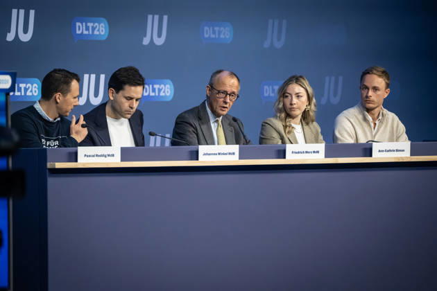 Pascal Reddig, Deputy Federal Chair of the JU; Johannes Winkel, Federal Chair of the JU; Friedrich Merz, Federal Chancellor; Ann Cathrin Simon, Deputy Federal Chair of the JU; Julien Jopp, Deputy Federal Chair of the JU, from left to right on stage following the Federal Chancellor’s speech at the 78th Germany Day 2026 in Bonn. Junge