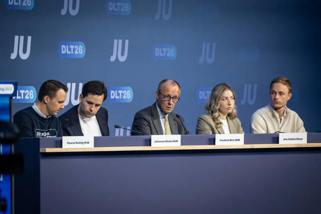 Pascal Reddig, Deputy Federal Chair of the JU; Johannes Winkel, Federal Chair of the JU; Friedrich Merz, Federal Chancellor; Ann Cathrin Simon, Deputy Federal Chair of the JU; Julien Jopp, Deputy Federal Chair of the JU, from left to right on stage following the Federal Chancellor’s speech at the 78th Germany Day 2026 in Bonn. Junge
