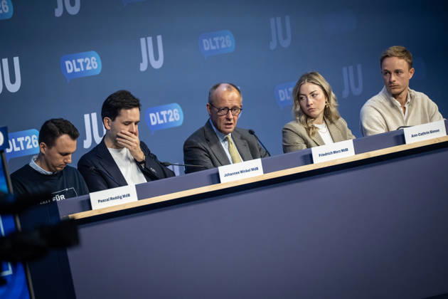 Pascal Reddig, Deputy Federal Chair of the JU; Johannes Winkel, Federal Chair of the JU; Friedrich Merz, Federal Chancellor; Ann Cathrin Simon, Deputy Federal Chair of the JU; Julien Jopp, Deputy Federal Chair of the JU, from left to right on stage following the Federal Chancellor’s speech at the 78th Germany Day 2026 in Bonn. Junge