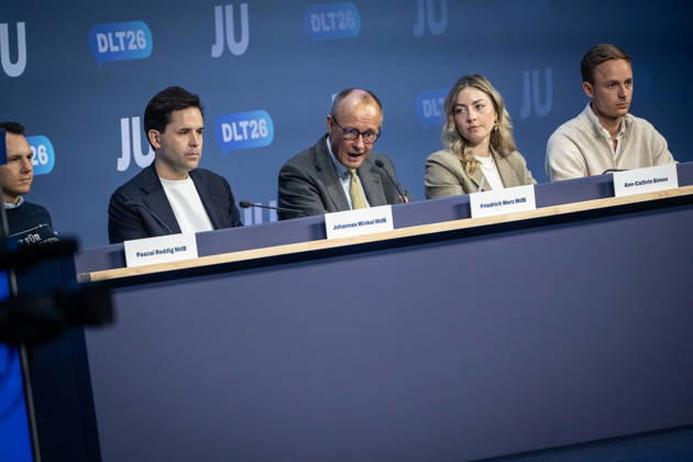 Pascal Reddig, Deputy Federal Chair of the JU; Johannes Winkel, Federal Chair of the JU; Friedrich Merz, Federal Chancellor; Ann Cathrin Simon, Deputy Federal Chair of the JU; Julien Jopp, Deputy Federal Chair of the JU, from left to right on stage following the Federal Chancellor’s speech at the 78th Germany Day 2026 in Bonn. Junge