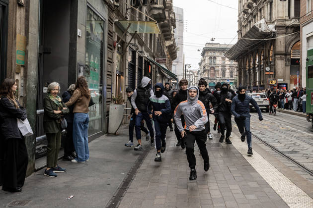 Police detain 160 as unrest continues for second day in Milan MILAN, ITALY - OCTOBER 18: Young protesters flee from police as they run through the streets, damaging shops and public property during urban unrest in Milan, Italy, on October 18, 2026, a day after protests against the rising cost of living. Groups threw stones, bottles, firecrackers and barriers at officers, who responded with tear gas and water cannon. Shops were damaged and looted around the city center, while a Carabinieri vehicle was destroyed. Andrea Carrubba Anadolu Milan Italy. Editorial use only. Please get in touch for any other usage.  Copyright: x2026xAnadoluxAndreaxCarrubbax