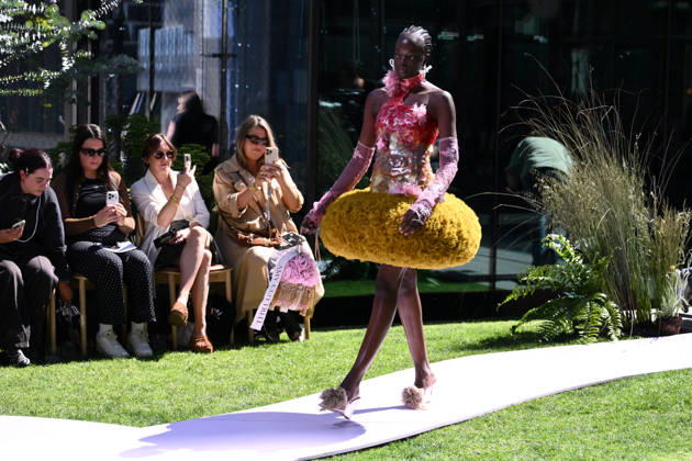 MELBOURNE FASHION WEEK PREVIEW, A model walks the runway during a 2026 Melbourne Fashion Week Runway Preview, at Sky Park, Melbourne, Monday, October 19, 2026. The preview features a selection of the upcoming collections that will appear on M FW runways including designers OUT OF HAND x Lisa Waup, Ebony Noire, Van Ermel Scherer, Perple, Gotham, Wilson Jedd Adams, Asiyam, Atoir, NGALI, Kuwaii, HoMie, Collective Closets x Mariam Farah, TOJHÃÄ, Amy Cottrell, BAAQIY and Sean Rentero. ( NO ARCHIVING MELBOURNE VICTORIA Australia Copyright: xJOELxCARRETTx 20261019119308015589