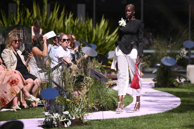 MELBOURNE FASHION WEEK PREVIEW, A model walks the runway during a 2026 Melbourne Fashion Week Runway Preview, at Sky Park, Melbourne, Monday, October 19, 2026. The preview features a selection of the upcoming collections that will appear on M FW runways including designers OUT OF HAND x Lisa Waup, Ebony Noire, Van Ermel Scherer, Perple, Gotham, Wilson Jedd Adams, Asiyam, Atoir, NGALI, Kuwaii, HoMie, Collective Closets x Mariam Farah, TOJHÃÄ, Amy Cottrell, BAAQIY and Sean Rentero. ( NO ARCHIVING MELBOURNE VICTORIA Australia Copyright: xJOELxCARRETTx 20261019148069176376