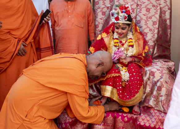 October 19, 2026, Guwahati, Assam, India: A young girl participate in the Kumari Puja ritual as part of the annual Durga Puja Festival at the Ram Krishna Mission, in Guwahati, India on Monday, 19 October 2026. Kumari Puja is a Hindu tradition observed during Durga Puja, Basanti Puja, and Navratri, in which young girls aged one to sixteen are worshipped as living embodiments of the Goddess, the ritual symbolises purity, divine feminine power, and spiritual devotion. Guwahati India - ZUMAt232 20261019_zip_t232_006 Copyright: xDavidxTalukdarx