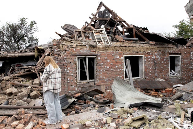 A woman stands among the rubble outside a house damaged by a Russian bombardment in Dnipro, Ukraine, October 19, 2026. On Monday morning, Russian forces launched guided aerial bombs at the eastern city, damaging private homes and infrastructure. An 84-year-old woman was hospitalised in moderate condition. (Photo by Mykola Miakshykov Ukrinform) Russian troops hit Dnipro with guided bombs  Copyright: xMykolaxMiakshykovx