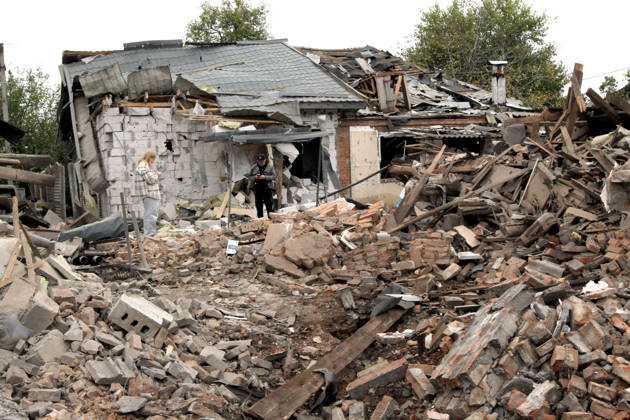 A man and a woman stand among the rubble near a house damaged by a Russian bombardment in Dnipro, Ukraine, October 19, 2026. On Monday morning, Russian forces launched guided aerial bombs at the eastern city, damaging private homes and infrastructure. An 84-year-old woman was hospitalised in moderate condition. (Photo by Mykola Miakshykov Ukrinform) Russian troops hit Dnipro with guided bombs  Copyright: xMykolaxMiakshykovx