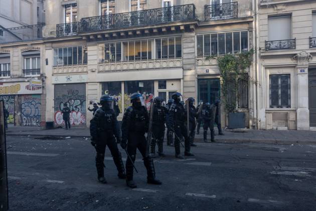 October 18, 2026, Paris, France: PARIS, FRANCE - OCTOBER 18, 2026: Protesters clash with police near Place de la RÃ publique in Paris during a protest against austerity. Protesters set up makeshift barricades and start fires in the square and surrounding streets. After police clear the square, protesters attack nearby shops. Paris France - ZUMAq101 20261018_zna_q101_299 Copyright: xOualidxAbdellaouix