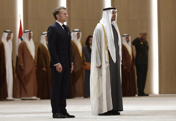 President Macron Visit To Middle East - Abu Dhabi Sheikh Mohamed bin Zayed Al Nahyan, President of the United Arab Emirates (UAE), and French President Emmanuel Macron review troops upon Macron s arrival at Zayed International Airport in Abu Dhabi, United Arab Emirates, October 19, 2026. Photo by Benoit Tessier Pool ABACAPRESS.COM Abu Dhabi United Arab Emirates Copyright: xTessierxBenoit Pool ABACAx