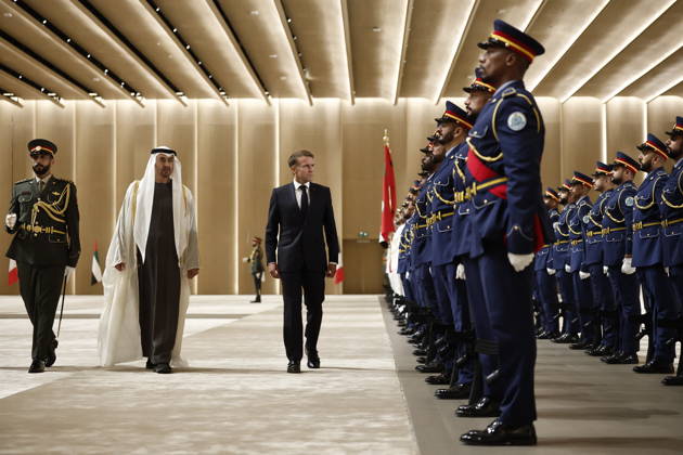 President Macron Visit To Middle East - Abu Dhabi Sheikh Mohamed bin Zayed Al Nahyan, President of the United Arab Emirates (UAE), and French President Emmanuel Macron review troops upon Macron s arrival at Zayed International Airport in Abu Dhabi, United Arab Emirates, October 19, 2026. Photo by Benoit Tessier Pool ABACAPRESS.COM Abu Dhabi United Arab Emirates  Copyright: xTessierxBenoit Pool ABACAx