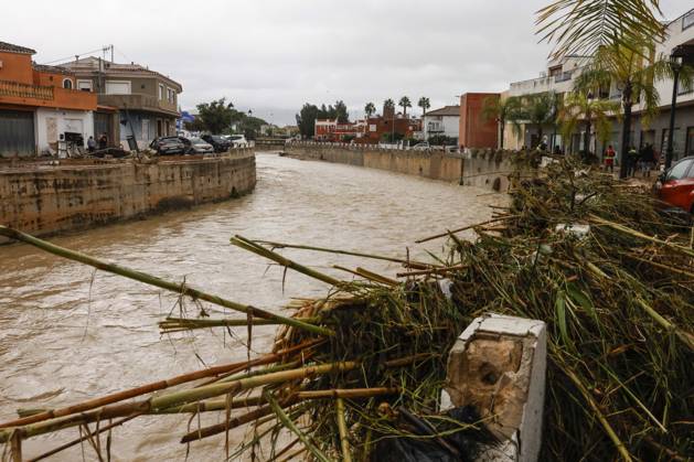 The Valencian Regional Government is preparing a lockdown order for the southern coast of Valencia and the northern coast of Alicante due to the rains. The river is filled with mud and vegetation carried by the rainwater, as of October 19, 2026, in Els Poblets, Valencian Community, Spain. The Valencian Regional Government is preparing a lockdown order for the southern coast of Valencia and the northern coast of Alicante in response to the emergency declared due to the rains caused by Storm Adam, as announced by the Regional Minister of Emergencies and the Interior early this morning, October 19, from the Emergency Coordination Center (CCE) October 19, 2026, Valencia, Valencian Community, Spain  Copyright: xRoberxSolsonax 7855638