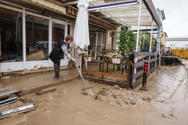 The Valencian Regional Government is preparing a lockdown order for the southern coast of Valencia and the northern coast of Alicante due to the rains. Several people are clearing mud from the streets while furniture they had to remove due to flooding caused by the heavy rains piles up, on October 19, 2026, in Els Poblets, Valencian Community, Spain. The Valencian Regional Government is preparing a lockdown order for the southern coast of Valencia and the northern coast of Alicante in response to the emergency declared due to the rains brought by Storm Adam, as announced by the Regional Minister of Emergencies and the Interior early this morning, October 19, from the Emergency Coordination Center (CCE) October 19, 2026, Valencia, Valencian  Copyright: xRoberxSolsonax 7855649