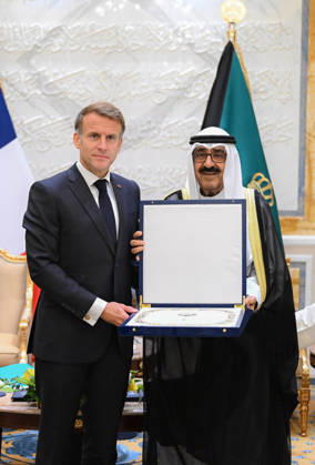 French President Emmanuel Macron in Kuwait KUWAIT CITY, KUWAIT - OCTOBER 19: (----EDITORIAL USE ONLY – MANDATORY CREDIT - AMIRI DIWAN OF THE STATE OF KUWAIT HANDOUT - NO MARKETING NO ADVERTISING CAMPAIGNS - DISTRIBUTED AS A SERVICE TO CLIENTS----) French President Emmanuel Macron receives the Order of Mubarak the Great, Kuwait s highest honor, presented by Emir of Kuwait Sheikh Meshal Al-Ahmad Al-Jaber Al-Sabah during an official visit at Bayan Palace in Kuwait City, Kuwait on October 19, 2026. Amiri Diwan of the State of Kuwait Anadolu Kuwait City Kuwait. Editorial use only. Please get in touch for any other usage.  Copyright: x2026xAnadoluxAmirixDiwanxofxthexStatexofxKuwaitx