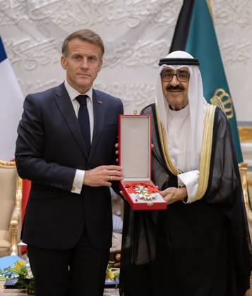 French President Emmanuel Macron in Kuwait KUWAIT CITY, KUWAIT - OCTOBER 19: (----EDITORIAL USE ONLY – MANDATORY CREDIT - AMIRI DIWAN OF THE STATE OF KUWAIT HANDOUT - NO MARKETING NO ADVERTISING CAMPAIGNS - DISTRIBUTED AS A SERVICE TO CLIENTS----) French President Emmanuel Macron presents the Legion of Honor (Legion d Honneur) medal to Emir of Kuwait Sheikh Meshal Al-Ahmad Al-Jaber Al-Sabah during an official visit at Bayan Palace in Kuwait City, Kuwait on October 19, 2026. Amiri Diwan of the State of Kuwait Anadolu Kuwait City Kuwait. Editorial use only. Please get in touch for any other usage.  Copyright: x2026xAnadoluxAmirixDiwanxofxthexStatexofxKuwaitx