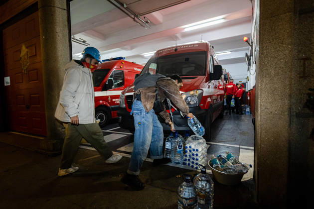 October 20, 2026, Porto, Portugal: Protesters store water supplies at a fire station near Praca D. Joao I during the clearance of the housing protest camp. Activists removed materials and belongings from the encampment as the occupation came to an end. Porto Portugal  - ZUMAs197 20261020_aaa_s197_052 Copyright: xDiogoxBaptistax