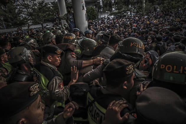 October 20, 2026, Yogyakarta, Special Region Of Yogyakarta, Indonesia: Special Region of Yogyakarta, October 20, 2026. A crowd comprising members of a community and student alliance staged a protest in front of the Special Region of Yogyakarta Regional People™s Representative Council (DPRD) building. During the protest, the demonstrators made several demands, including that forest and land fires and floods be declared national disasters; that strict action be taken against the corporations involved; and that the cost of education and healthcare be reduced and access to these services be made more equitable. Yogyakarta Indonesia - ZUMAf198 20261020_zip_f198_006 Copyright: xMuhammadxFebriansyahx