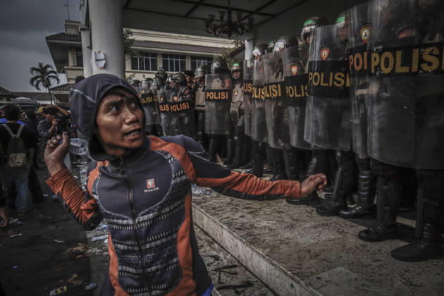 October 20, 2026, Yogyakarta, Special Region Of Yogyakarta, Indonesia: Special Region of Yogyakarta. A crowd comprising members of a community and student alliance staged a protest in front of the Special Region of Yogyakarta Regional People s Representative Council (DPRD) building. During the protest, the demonstrators made several demands, including that forest and land fires and floods be declared national disasters; that strict action be taken against the corporations involved; and that the cost of education and healthcare be reduced and access to these services be made more equitable. Yogyakarta Indonesia  - ZUMAf198 20261020_zip_f198_005 Copyright: xMuhammadxFebriansyahx