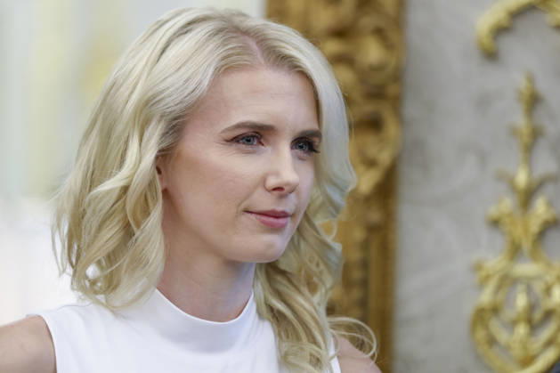 Special Assistant to the President Natalie Harp looks on as President Donald Trump speaks to reporters about efforts to crack down on taxpayer fraud in the Oval Office of the White House in Washington, DC on Tuesday, October 20, 2026.  WASP20261020141 JIMxLOxSCALZO