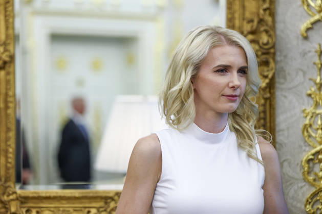 Special Assistant to the President Natalie Harp looks on as President Donald Trump speaks to reporters about efforts to crack down on taxpayer fraud in the Oval Office of the White House in Washington, DC on Tuesday, October 20, 2026.  WASP20261020142 JIMxLOxSCALZO
