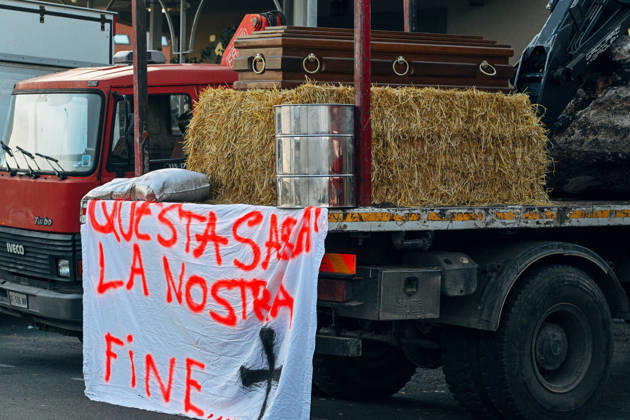 Shops closed due to protests in Vibo Valentia CALABRIA, ITALY - OCTOBER 20: A coffin with a while sheet quoting this will be our end seen at St. Onofrio’s crossroad.Protests for hight cost of living and fuel prices spontaneously organized by truck drivers and workers in agriculture sector sparkled in Calabria, South Italy, since early October, severely affecting supply chain distribution. in Vibo Valentia protests go on with closed shop, for disruption of HGV supply chain, and local audience attending pacific protests at S. Onofrio’s crossroad. Protests in Calabria will go on until October 27th. Valeria Ferraro Anadolu Calabria Italy. Editorial use only. Please get in touch for any other usage.  Copyright: x2026xAnadoluxValeriaxFerrarox