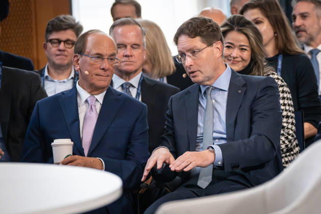 Larry Fink (Laurence Douglas Fink) with Starbucks Coffee’s Pappbecker in the front row at the Berlin Global Dialogue in the former State Council building of the GDR; seated to his right is Ola Källenius, CEO of Mercedes-Benz Group AG. Berlin Global Dialogue 2026 (BGD 2026), theme: Advancing Alliances for a New Era, Berlin, Berlin, Germany, ESMT