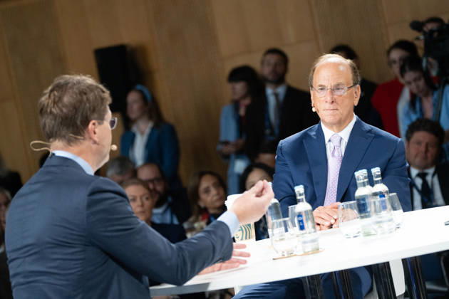 Larry Fink (Laurence Douglas Fink), CEO of BlackRock, speaks at the Berlin Global Dialogue in the former State Council building of the GDR, in conversation with Ola Källenius, CEO of Mercedes-Benz Group AG (on the left in the photo). Berlin Global Dialogue 2026 (BGD 2026), theme: Advancing Alliances for a New Era, Berlin, Berlin, Germany, ESMT