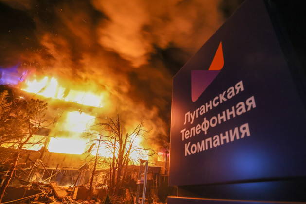 RUSSIA, LUGANSK - OCTOBER 21, 2026: A fire breaks out after a Ukrainian drone strike on a communication hub. Alexander Reka TASS  99700342