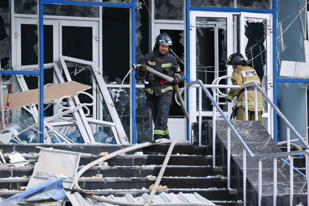 RUSSIA, LUGANSK - OCTOBER 21, 2026: Emergency workers respond to the scene of a Ukrainian drone strike on a communication hub. Alexander Reka TASS  99700497