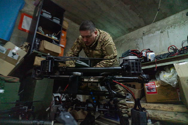 Ukrainian drone unit Skymonsters upgrades heavy UAVs in Kharkiv region KHARKIV REGION, UKRAINE - OCTOBER 21: Members of Skymonsters, the drone unit of the 13th Khartiia Brigade of Ukraine s National Guard, assemble, upgrade, and repair large unmanned aerial vehicles at an undisclosed location in Kharkiv region, Ukraine, on October 21, 2026. The drones, including Vampire models used for logistics missions and heavy bombers capable of carrying 13 to 20 kilograms of explosives, are prepared here before deployment to frontline positions. Carlo Bravo Anadolu Kharkiv Ukraine. Editorial use only. Please get in touch for any other usage.  Copyright: x2026xAnadoluxCarloxBravox
