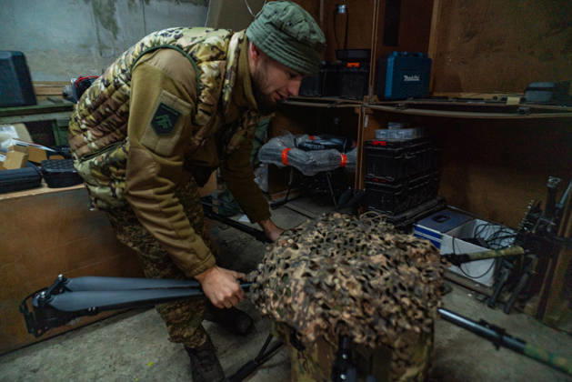 Ukrainian drone unit Skymonsters upgrades heavy UAVs in Kharkiv region KHARKIV REGION, UKRAINE - OCTOBER 21: Members of Skymonsters, the drone unit of the 13th Khartiia Brigade of Ukraine s National Guard, assemble, upgrade, and repair large unmanned aerial vehicles at an undisclosed location in Kharkiv region, Ukraine, on October 21, 2026. The drones, including Vampire models used for logistics missions and heavy bombers capable of carrying 13 to 20 kilograms of explosives, are prepared here before deployment to frontline positions. Carlo Bravo Anadolu Kharkiv Ukraine. Editorial use only. Please get in touch for any other usage.  Copyright: x2026xAnadoluxCarloxBravox