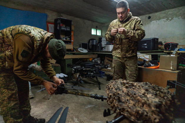 Ukrainian drone unit Skymonsters upgrades heavy UAVs in Kharkiv region KHARKIV REGION, UKRAINE - OCTOBER 21: Members of Skymonsters, the drone unit of the 13th Khartiia Brigade of Ukraine s National Guard, assemble, upgrade, and repair large unmanned aerial vehicles at an undisclosed location in Kharkiv region, Ukraine, on October 21, 2026. The drones, including Vampire models used for logistics missions and heavy bombers capable of carrying 13 to 20 kilograms of explosives, are prepared here before deployment to frontline positions. Carlo Bravo Anadolu Kharkiv Ukraine. Editorial use only. Please get in touch for any other usage.  Copyright: x2026xAnadoluxCarloxBravox
