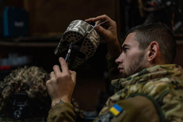Ukrainian drone unit Skymonsters upgrades heavy UAVs in Kharkiv region KHARKIV REGION, UKRAINE - OCTOBER 21: Members of Skymonsters, the drone unit of the 13th Khartiia Brigade of Ukraine s National Guard, assemble, upgrade, and repair large unmanned aerial vehicles at an undisclosed location in Kharkiv region, Ukraine, on October 21, 2026. The drones, including Vampire models used for logistics missions and heavy bombers capable of carrying 13 to 20 kilograms of explosives, are prepared here before deployment to frontline positions. Carlo Bravo Anadolu Kharkiv Ukraine. Editorial use only. Please get in touch for any other usage.  Copyright: x2026xAnadoluxCarloxBravox