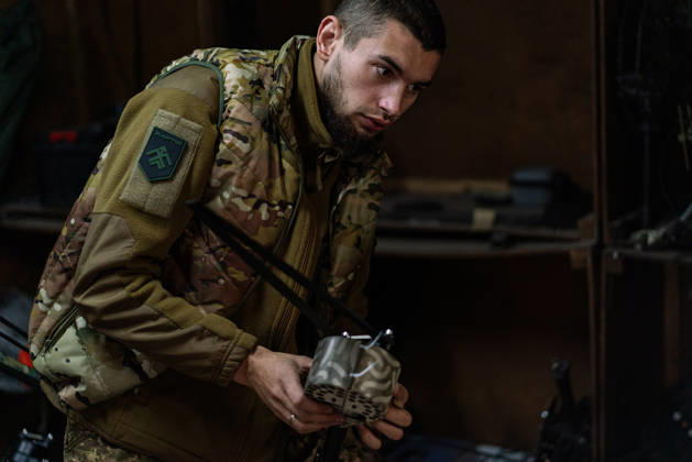 Ukrainian drone unit Skymonsters upgrades heavy UAVs in Kharkiv region KHARKIV REGION, UKRAINE - OCTOBER 21: Members of Skymonsters, the drone unit of the 13th Khartiia Brigade of Ukraine s National Guard, assemble, upgrade, and repair large unmanned aerial vehicles at an undisclosed location in Kharkiv region, Ukraine, on October 21, 2026. The drones, including Vampire models used for logistics missions and heavy bombers capable of carrying 13 to 20 kilograms of explosives, are prepared here before deployment to frontline positions. Carlo Bravo Anadolu Kharkiv Ukraine. Editorial use only. Please get in touch for any other usage.  Copyright: x2026xAnadoluxCarloxBravox