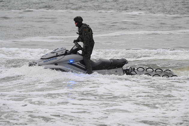 German Armed Forces Unveil New Biber Watercraft The German Navy presents its new Biber watercraft during a dynamic demonstration Soldiers demonstrate the fast and agile, militarily modified jet skis of the Maritime Interdiction Secur Copyright: xdiebildwerftx